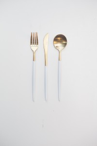white and gold cutlery hire